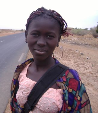 Mädchen, Senegal: Cadeau für Foto