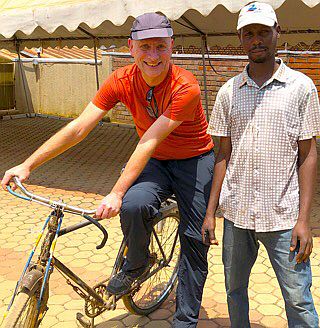 Bike, old white man, young black man