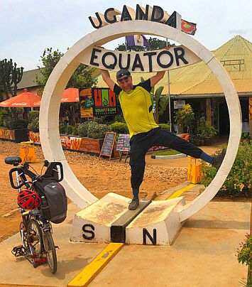 Chris on the Bike at the Equator in Kayabwe/Uganda